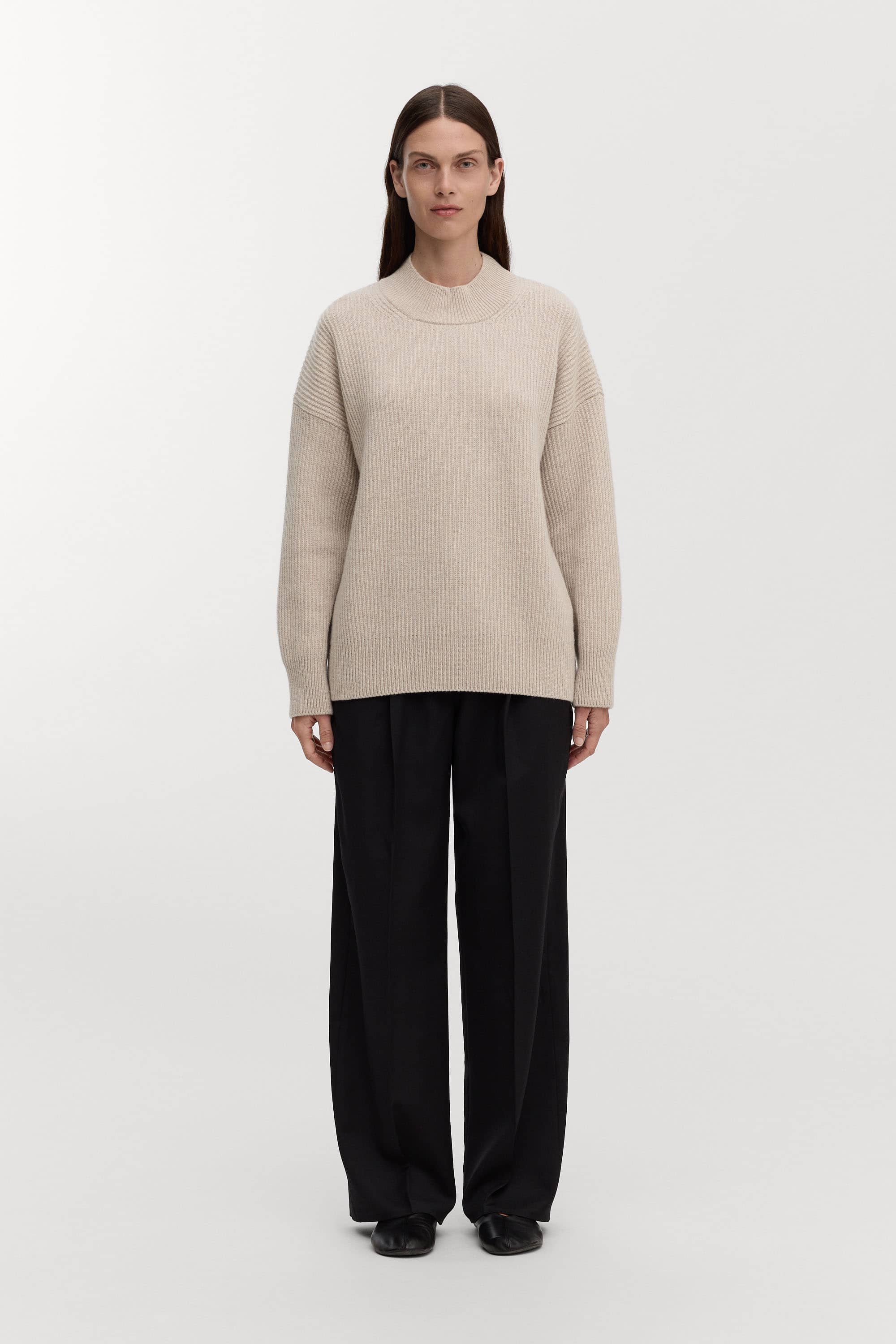 ASKET Mock Neck Sweater — original model photograph